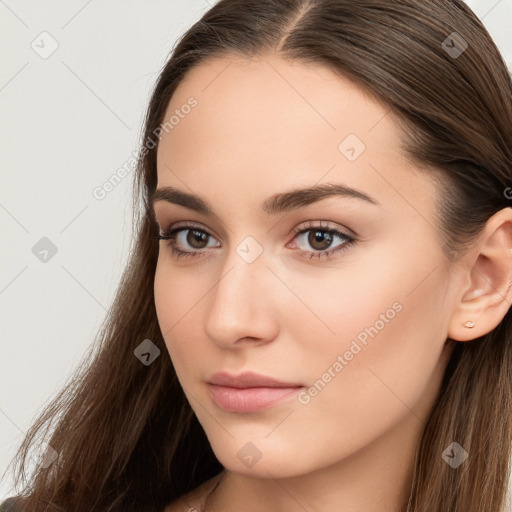 Neutral white young-adult female with long  brown hair and brown eyes