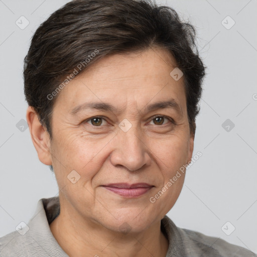 Joyful white adult female with short  brown hair and brown eyes