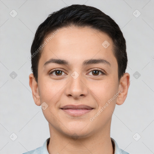 Joyful white young-adult male with short  brown hair and brown eyes