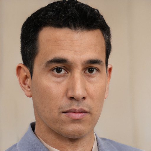 Neutral asian young-adult male with short  brown hair and brown eyes