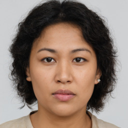 Neutral asian young-adult female with medium  brown hair and brown eyes