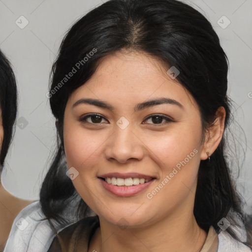 Joyful asian young-adult female with medium  brown hair and brown eyes