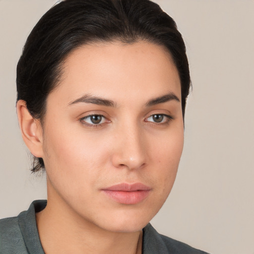 Neutral white young-adult female with medium  brown hair and brown eyes