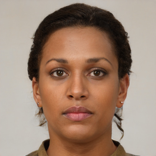 Neutral black young-adult female with short  brown hair and brown eyes
