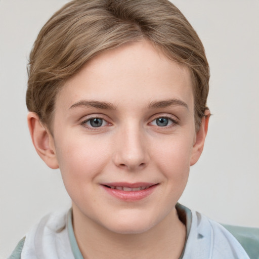 Joyful white child female with short  brown hair and grey eyes