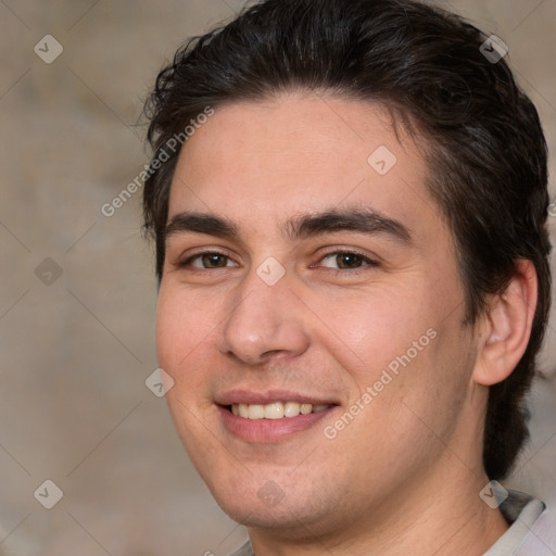 Joyful white young-adult male with medium  brown hair and brown eyes