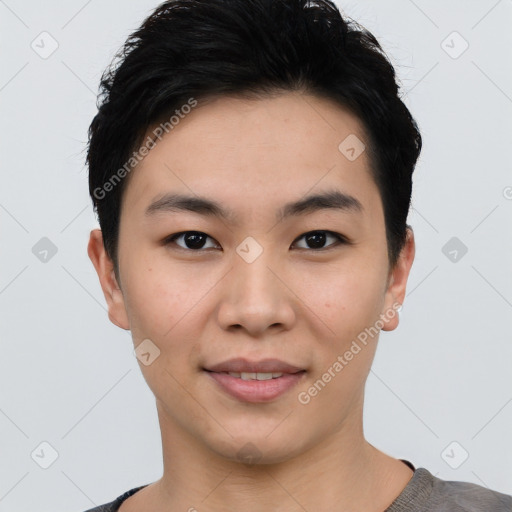 Joyful asian young-adult female with short  black hair and brown eyes