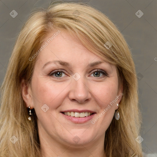 Joyful white adult female with medium  brown hair and green eyes