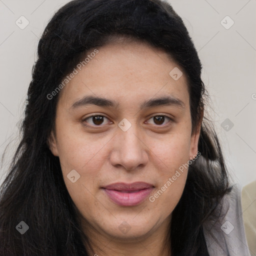 Joyful latino young-adult female with long  brown hair and brown eyes