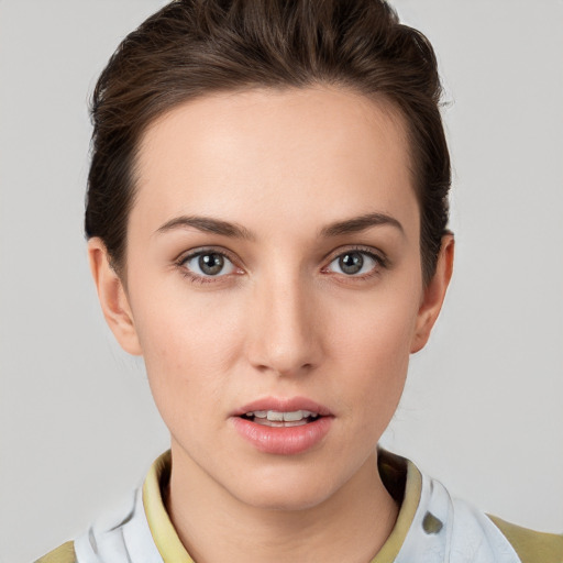 Neutral white young-adult female with short  brown hair and brown eyes