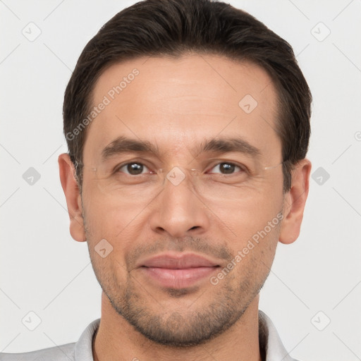 Joyful white adult male with short  brown hair and brown eyes