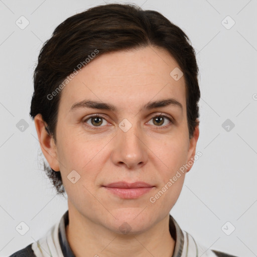 Joyful white young-adult female with short  brown hair and grey eyes