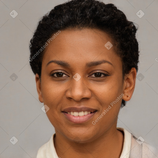 Joyful black young-adult female with short  brown hair and brown eyes