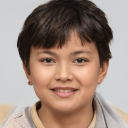 Joyful white child female with short  brown hair and brown eyes