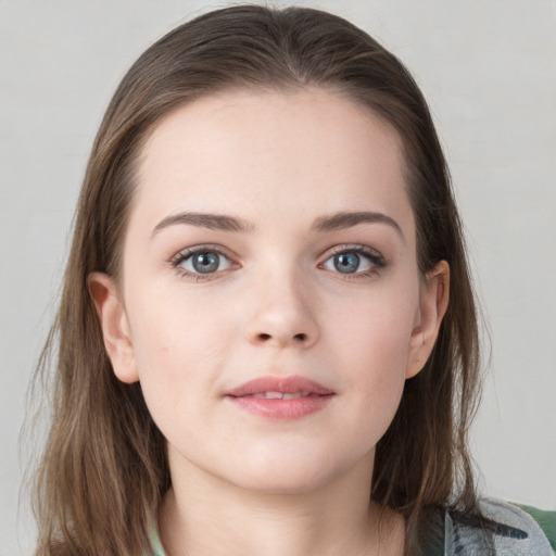 Neutral white young-adult female with medium  brown hair and grey eyes