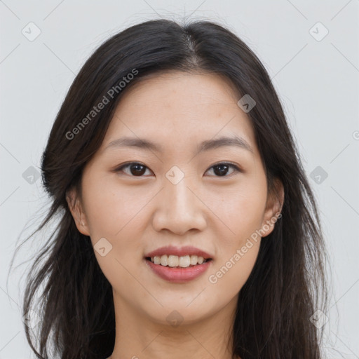 Joyful asian young-adult female with long  brown hair and brown eyes