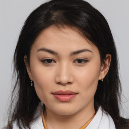 Neutral asian young-adult female with medium  brown hair and brown eyes