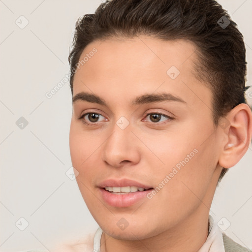 Joyful white young-adult female with short  brown hair and brown eyes