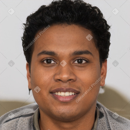 Joyful black young-adult male with short  brown hair and brown eyes