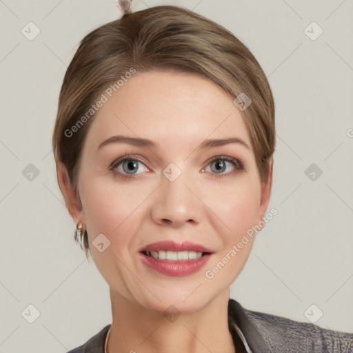 Joyful white young-adult female with short  brown hair and grey eyes