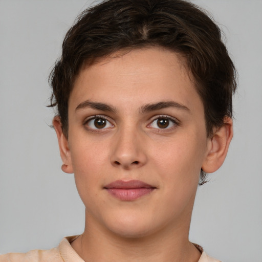 Neutral white young-adult female with short  brown hair and brown eyes