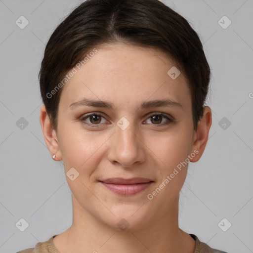 Joyful white young-adult female with short  brown hair and brown eyes