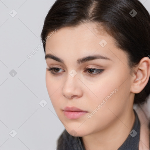 Neutral white young-adult female with long  brown hair and brown eyes