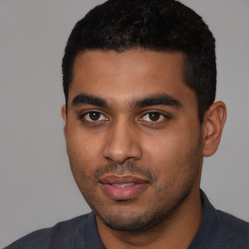 Neutral latino young-adult male with short  black hair and brown eyes