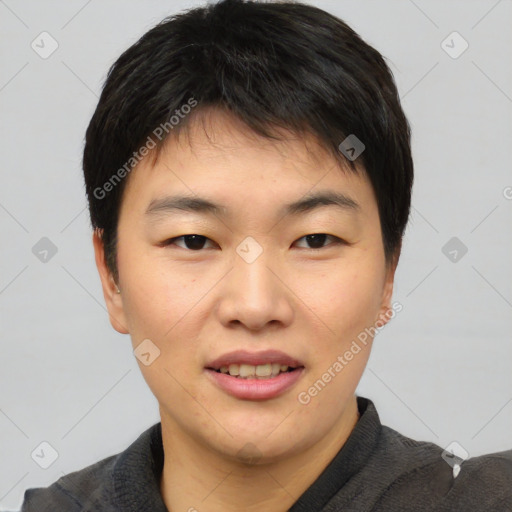 Joyful asian young-adult male with short  brown hair and brown eyes