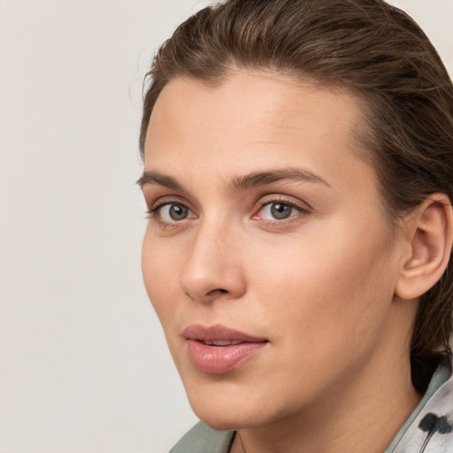 Neutral white young-adult female with medium  brown hair and grey eyes