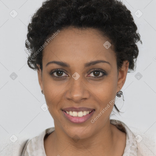 Joyful black young-adult female with short  brown hair and brown eyes