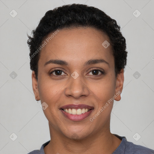 Joyful latino young-adult female with short  black hair and brown eyes