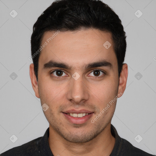 Joyful white young-adult male with short  black hair and brown eyes