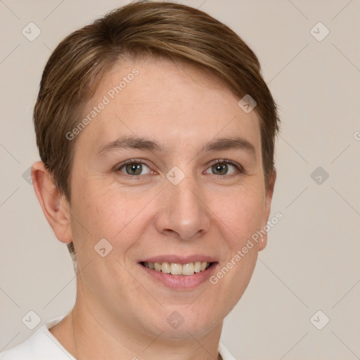 Joyful white young-adult female with short  brown hair and grey eyes