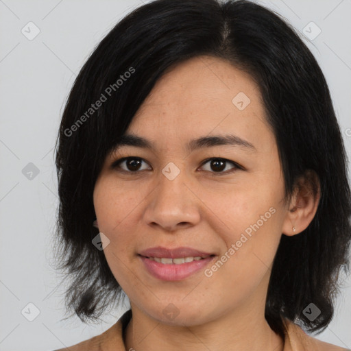 Joyful asian young-adult female with medium  black hair and brown eyes