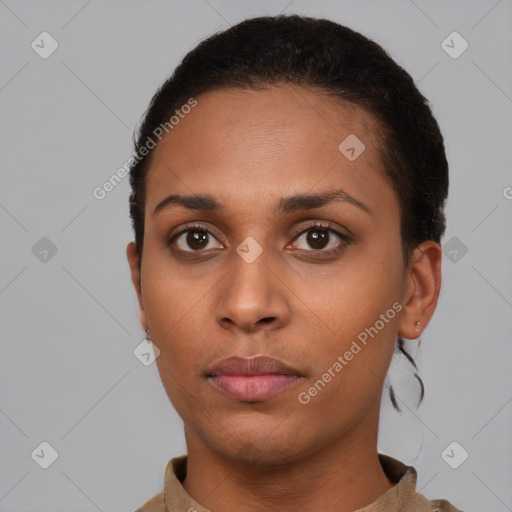 Neutral latino young-adult female with short  brown hair and brown eyes