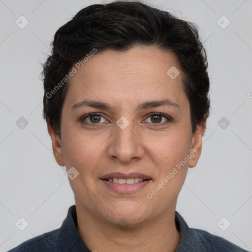 Joyful white adult female with short  brown hair and grey eyes