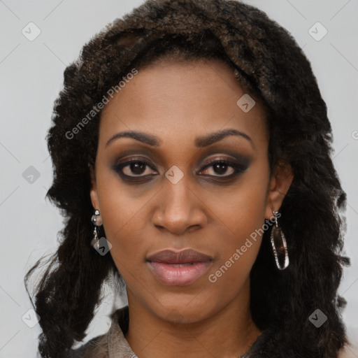 Joyful black young-adult female with long  brown hair and brown eyes