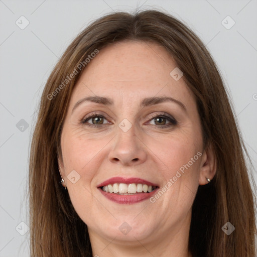 Joyful white adult female with long  brown hair and grey eyes