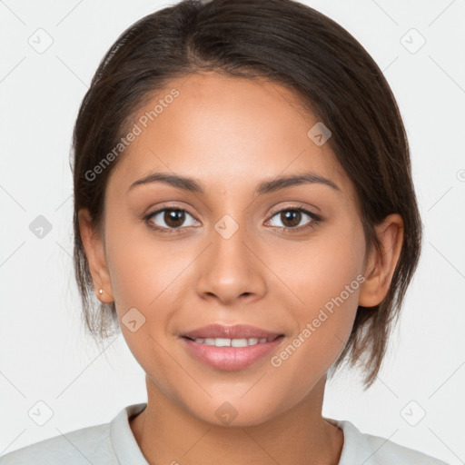 Joyful white young-adult female with medium  brown hair and brown eyes