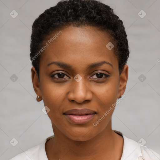 Joyful black young-adult female with short  black hair and brown eyes