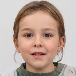 Joyful white child female with medium  brown hair and grey eyes