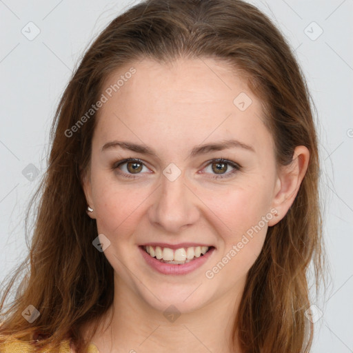 Joyful white young-adult female with long  brown hair and green eyes