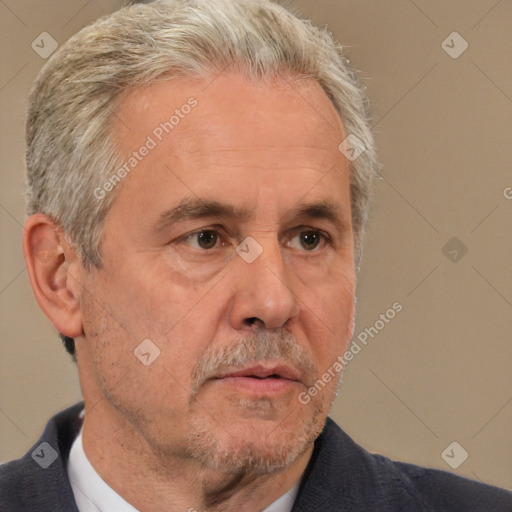 Neutral white middle-aged male with short  gray hair and brown eyes