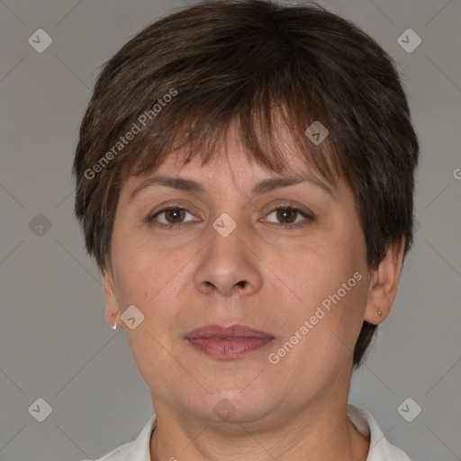 Joyful white adult female with short  brown hair and brown eyes