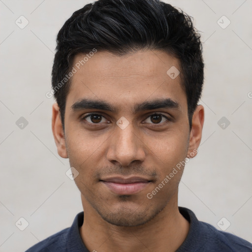 Joyful latino young-adult male with short  black hair and brown eyes