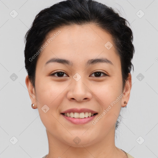 Joyful asian young-adult female with medium  brown hair and brown eyes