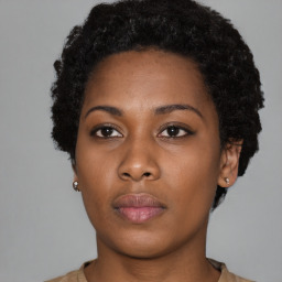 Neutral black young-adult female with short  black hair and brown eyes