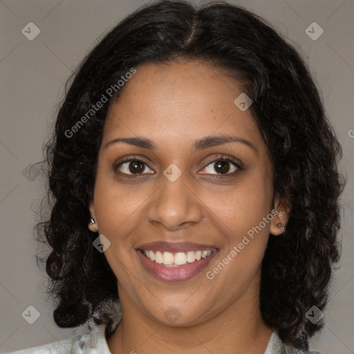 Joyful black young-adult female with medium  brown hair and brown eyes