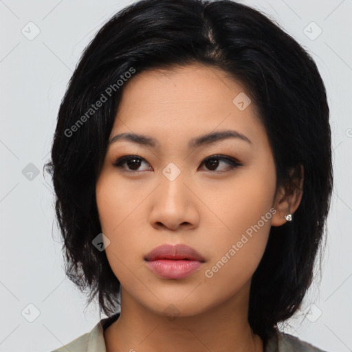 Neutral asian young-adult female with medium  black hair and brown eyes